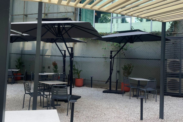 Showcasing a vibrant Blue Tokai outlet, this collection illustrates the premium quality of retail space developed by Infinity Group. From the modern glass interiors and sleek service counters to the relaxing open-air seating zones, these images define the high standard of our shops for rent. For businesses seeking visibility and ambiance, this location offers an exceptional retail space for rent, perfectly blending contemporary architecture with a welcoming customer experience.