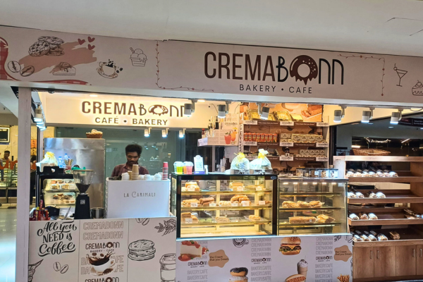 The aroma of cinnamon from CREMABONN BAKERY filled the retail space in Saltlake Sector V. Mr. Sharma, an F&B entrepreneur, had chosen this Grade-A tower by Infinity Group for its captive audience of IT professionals. His cafe thrived amidst the sleek glass facades, a sweet, bustling counterpoint to the corporate buzz. This was the future of Kolkata retail.