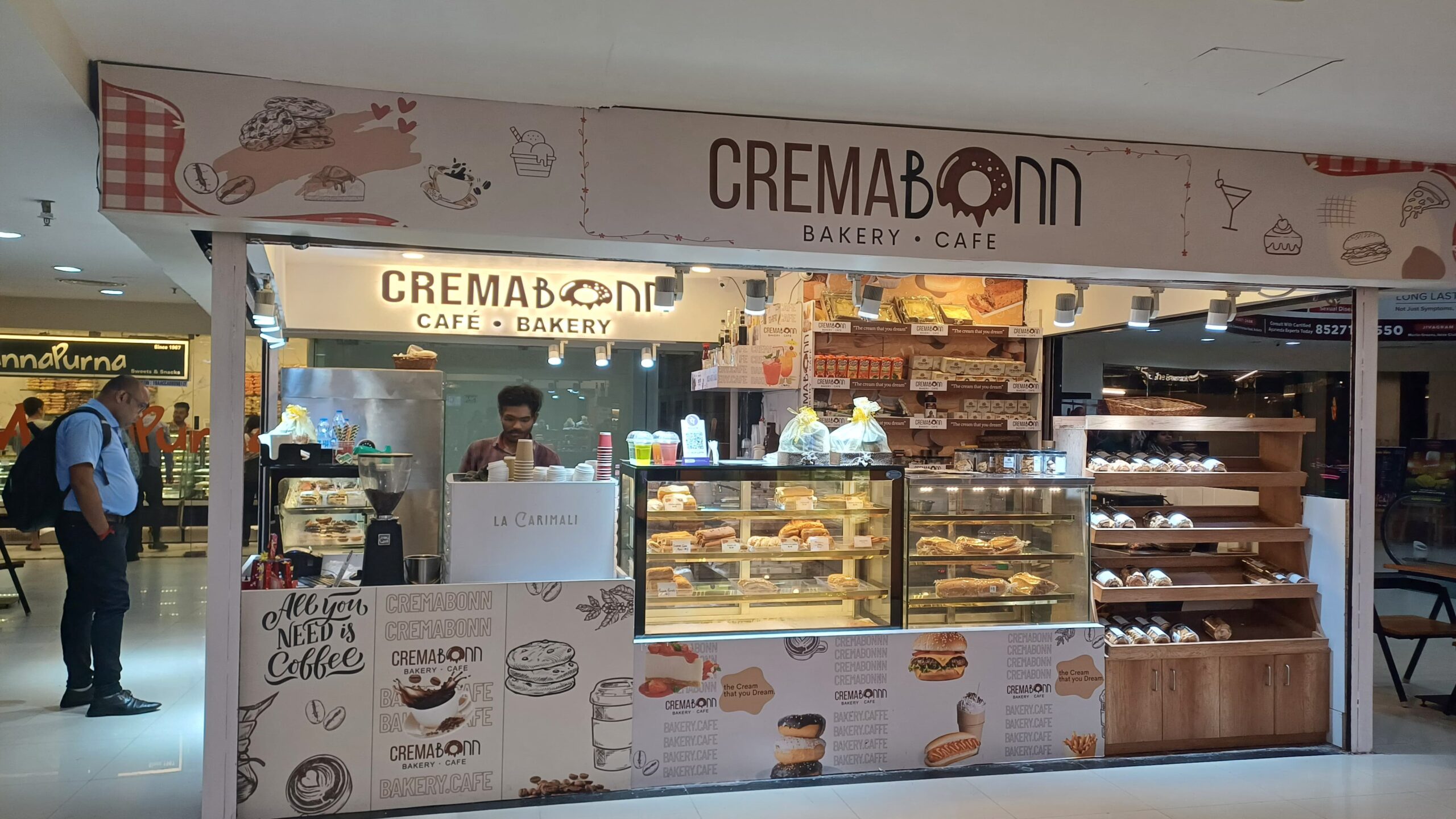 The aroma of cinnamon from CREMABONN BAKERY filled the retail space in Saltlake Sector V. Mr. Sharma, an F&B entrepreneur, had chosen this Grade-A tower by Infinity Group for its captive audience of IT professionals. His cafe thrived amidst the sleek glass facades, a sweet, bustling counterpoint to the corporate buzz. This was the future of Kolkata retail.